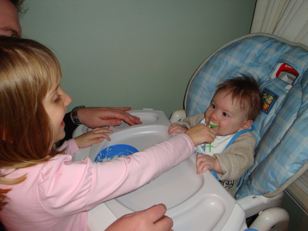 12-19-09 Emma Feeding Sean